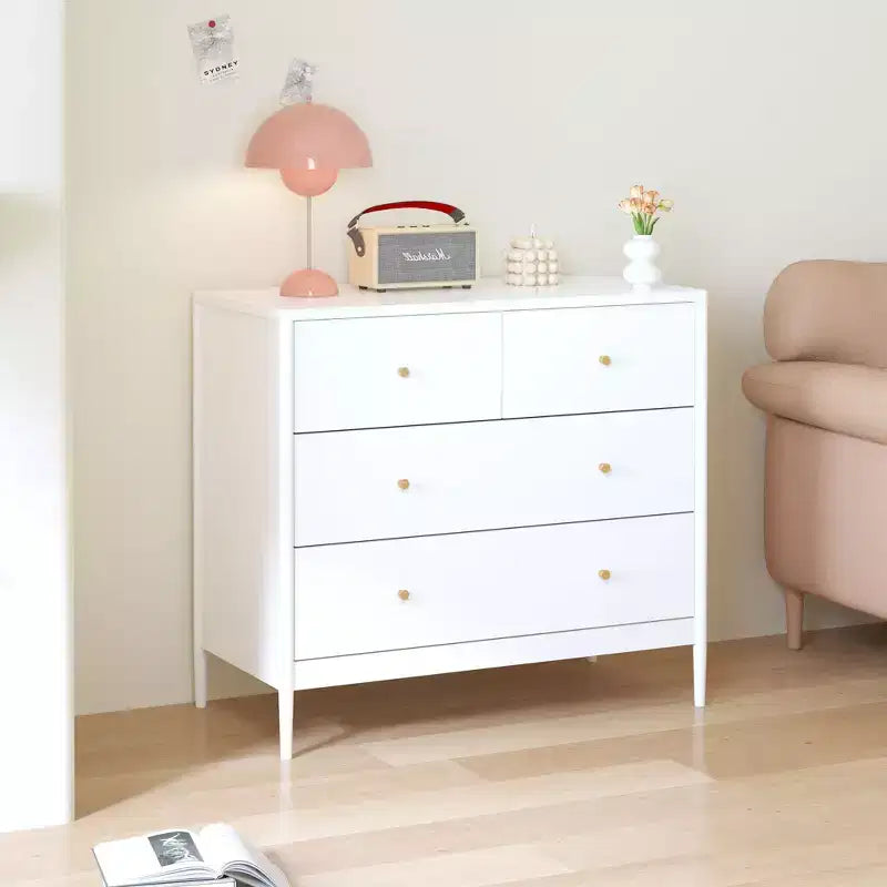 Armoire pour enfants à quatre tiroirs blanche, un meuble de rangement en bois adapté aux chambres d'enfants, aux crèches et aux placards