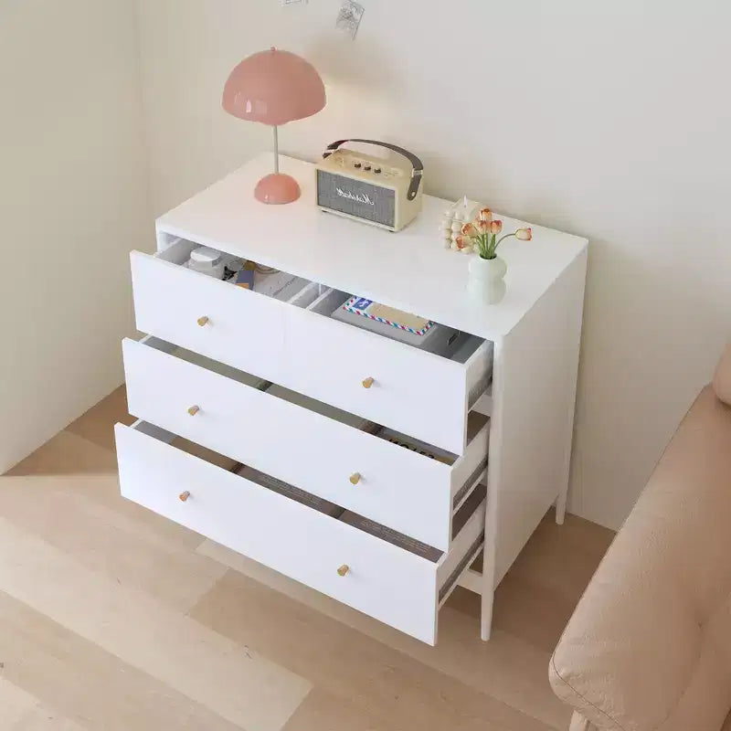 Armoire pour enfants à quatre tiroirs blanche, un meuble de rangement en bois adapté aux chambres d'enfants, aux crèches et aux placards